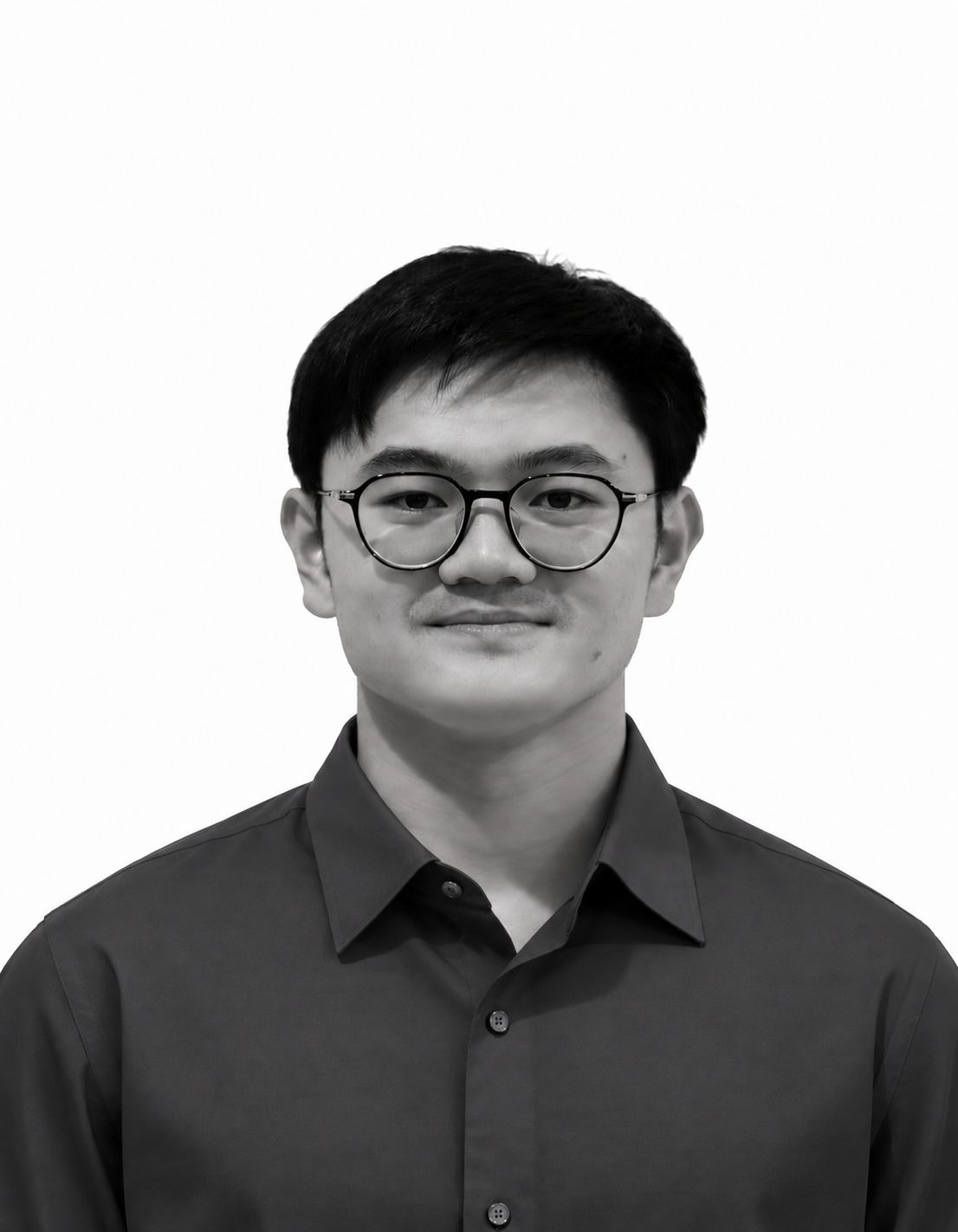 Portrait of Khant Myo wearing glasses and a black shirt