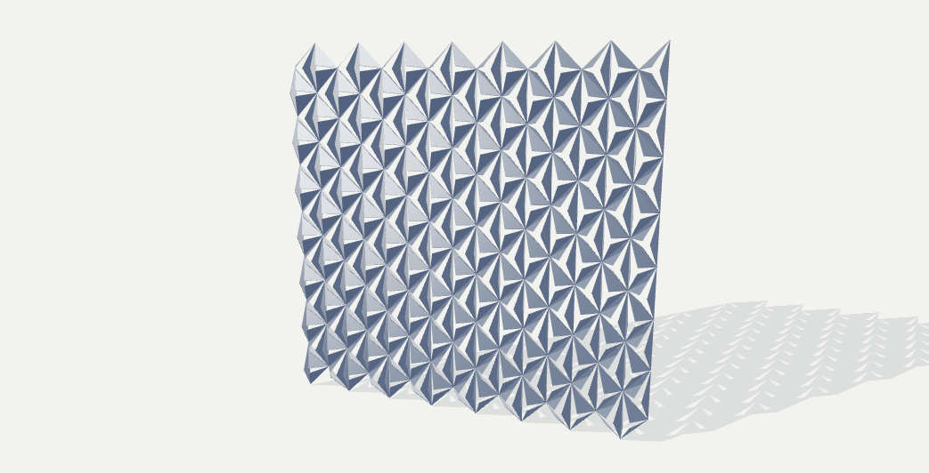 Steel kinetic facade with hinged triangular panels